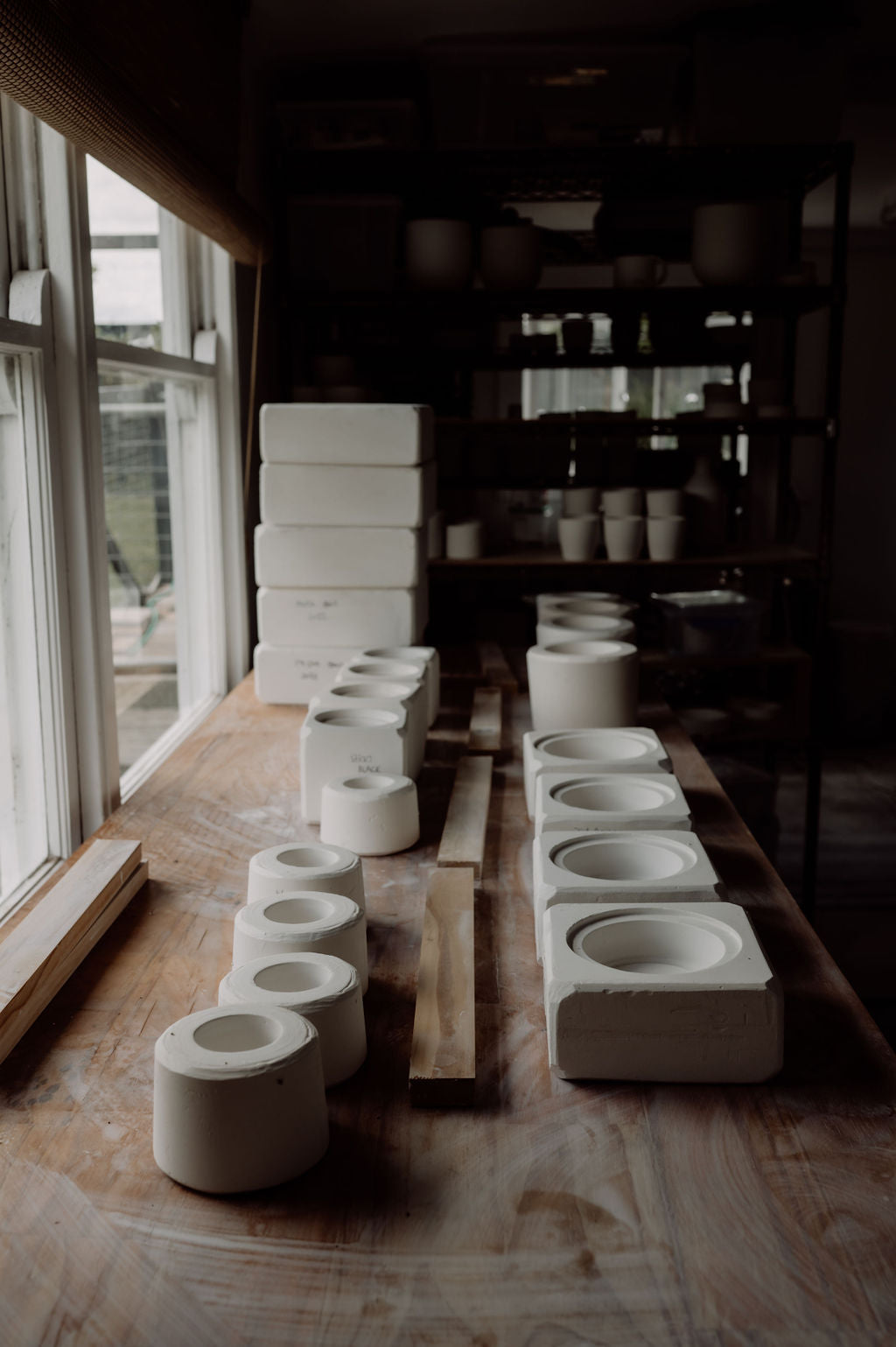 plaster slipcasting moulds on a table in the Henry & Tunks ceramic studio